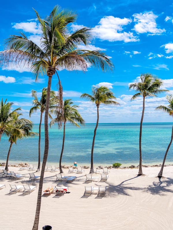 Private beach, white sand, sun loungers, beach towels