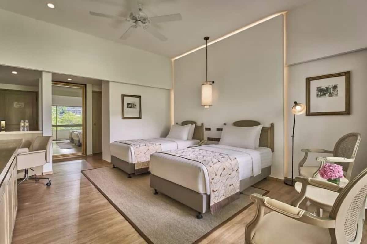 In-room safe, desk, iron/ironing board, free cribs/infant beds