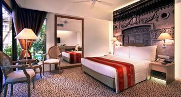 Deluxe Poolside Room | In-room safe, desk, iron/ironing board, free cribs/infant beds