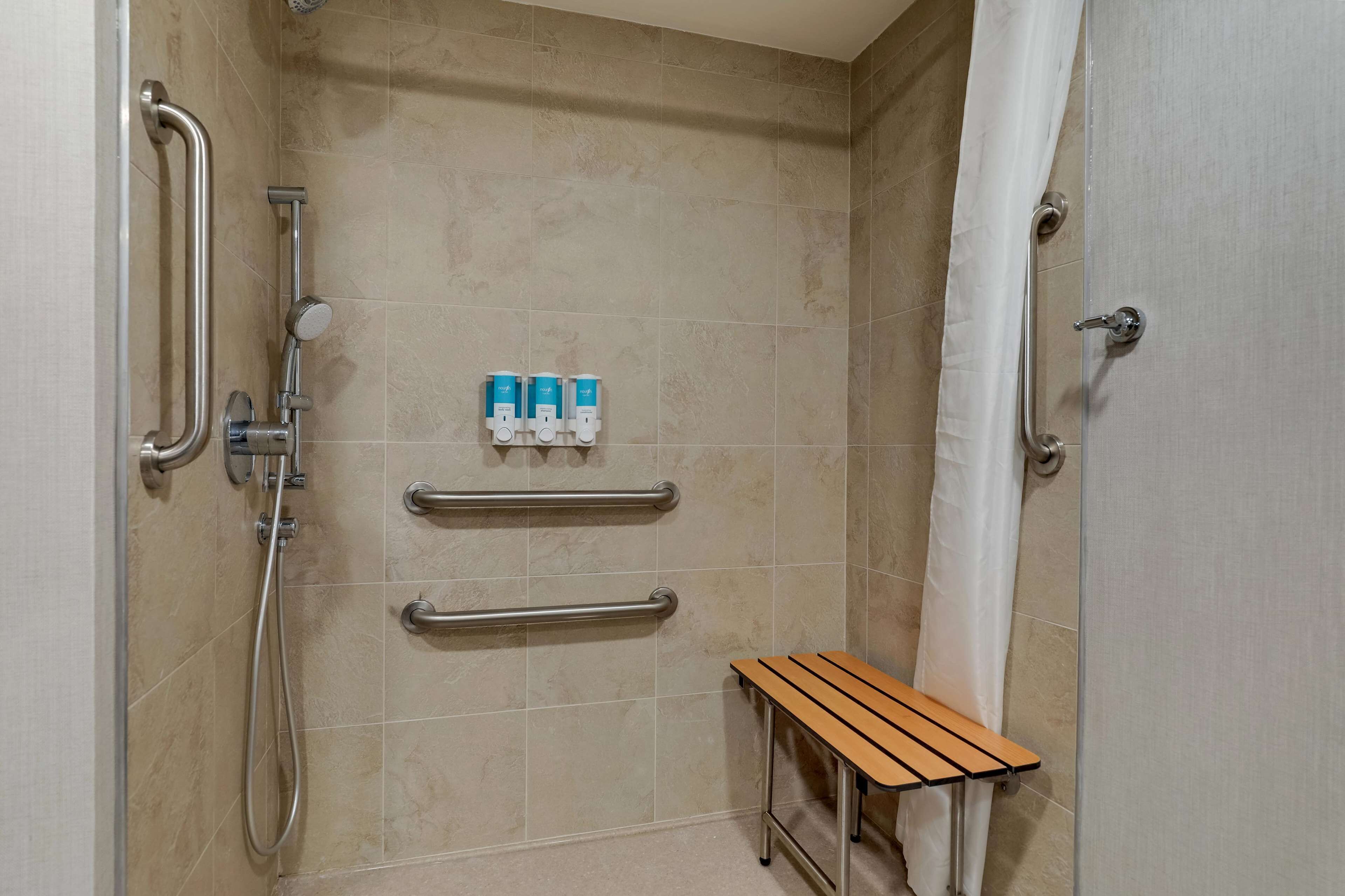 suite, 2 queen beds, accessible, refrigerator & microwave (sofabed, roll in shower) | bathroom | combined shower/bathtub, free toiletries, hair dryer, towels