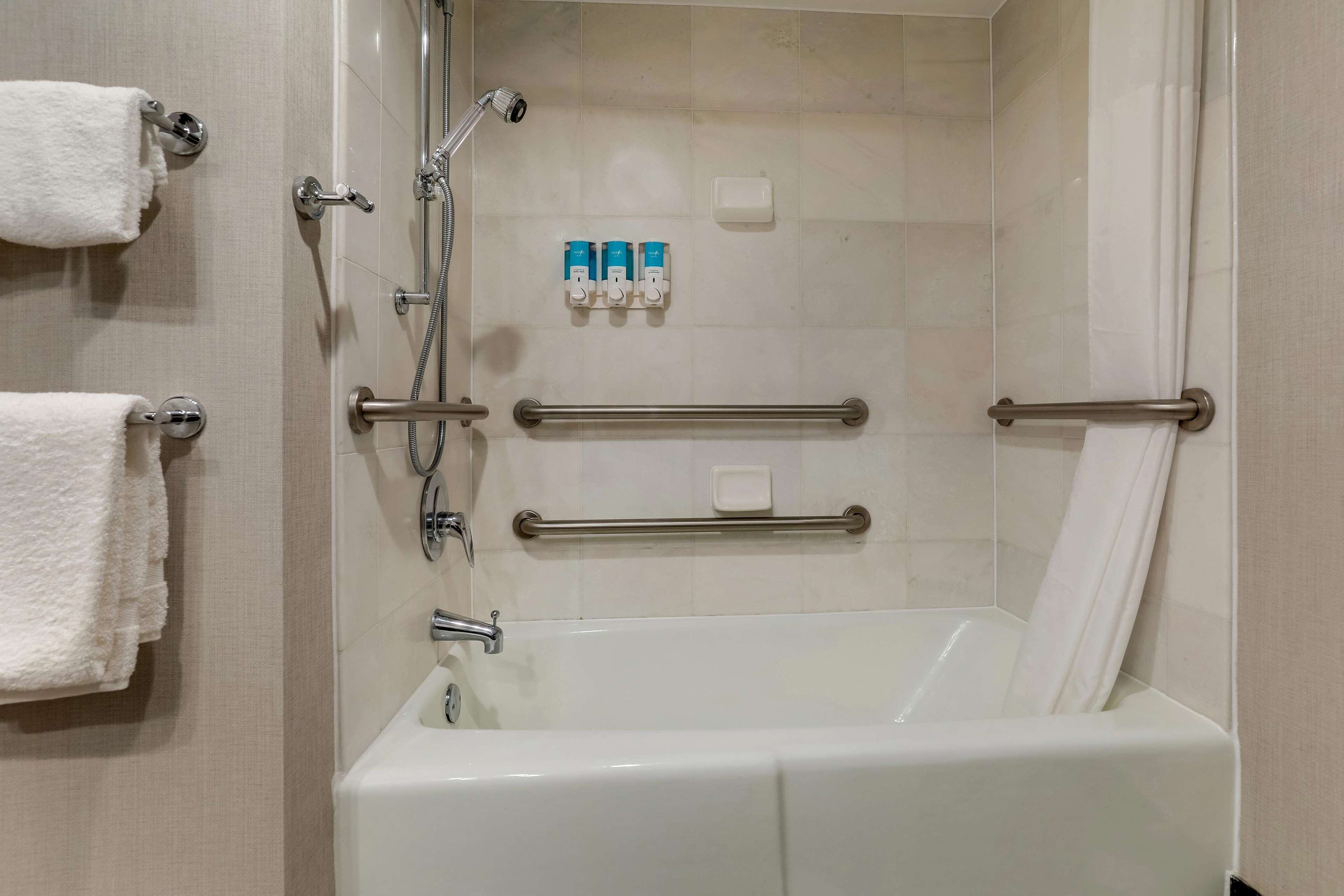 combined shower/bathtub, free toiletries, hair dryer, towels