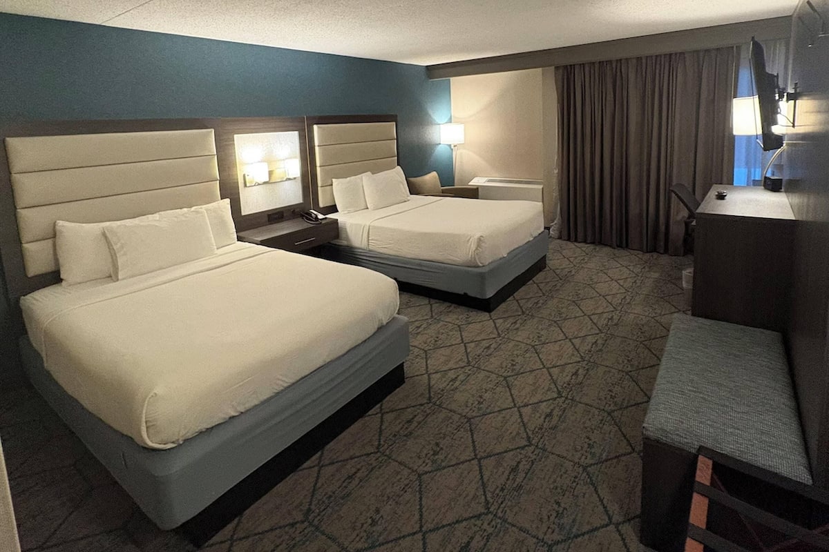 Standard Room, 2 Queen Beds, Non Smoking | Down comforters, in-room safe, desk, laptop workspace