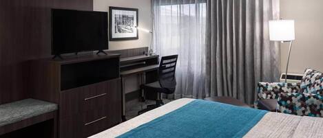 Habitación estándar, 1 cama King size, para no fumadores | Edredón, caja de seguridad en la habitación y escritorio