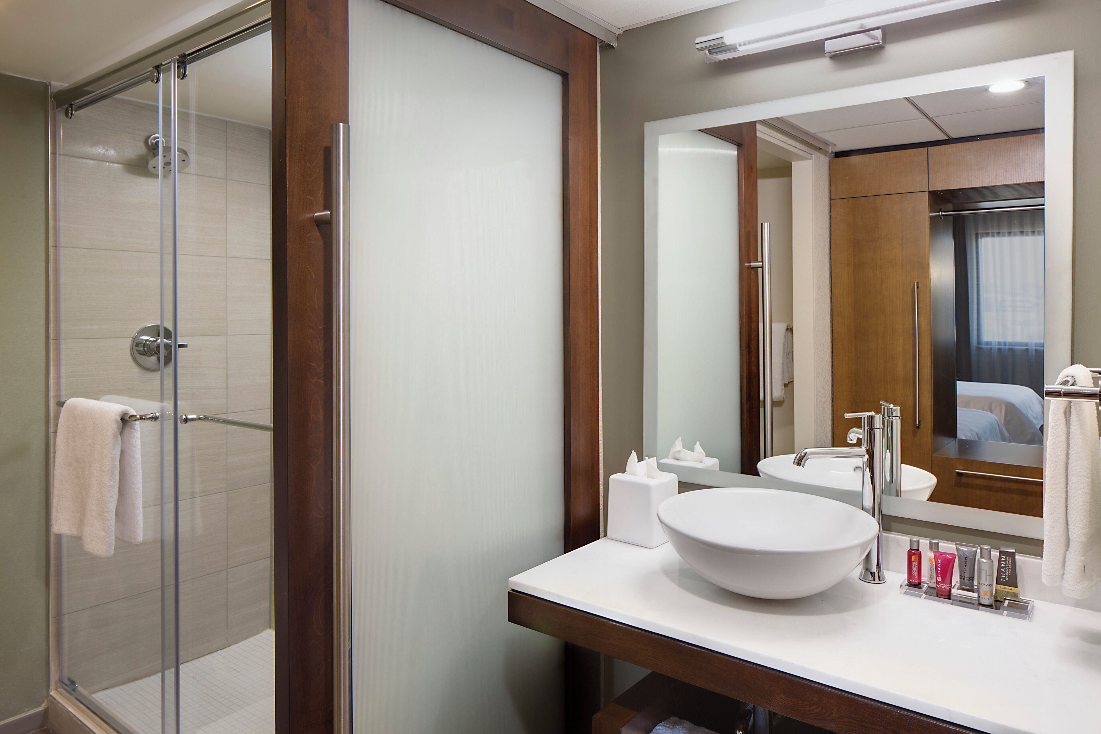 designer toiletries, hair dryer, bathrobes, towels