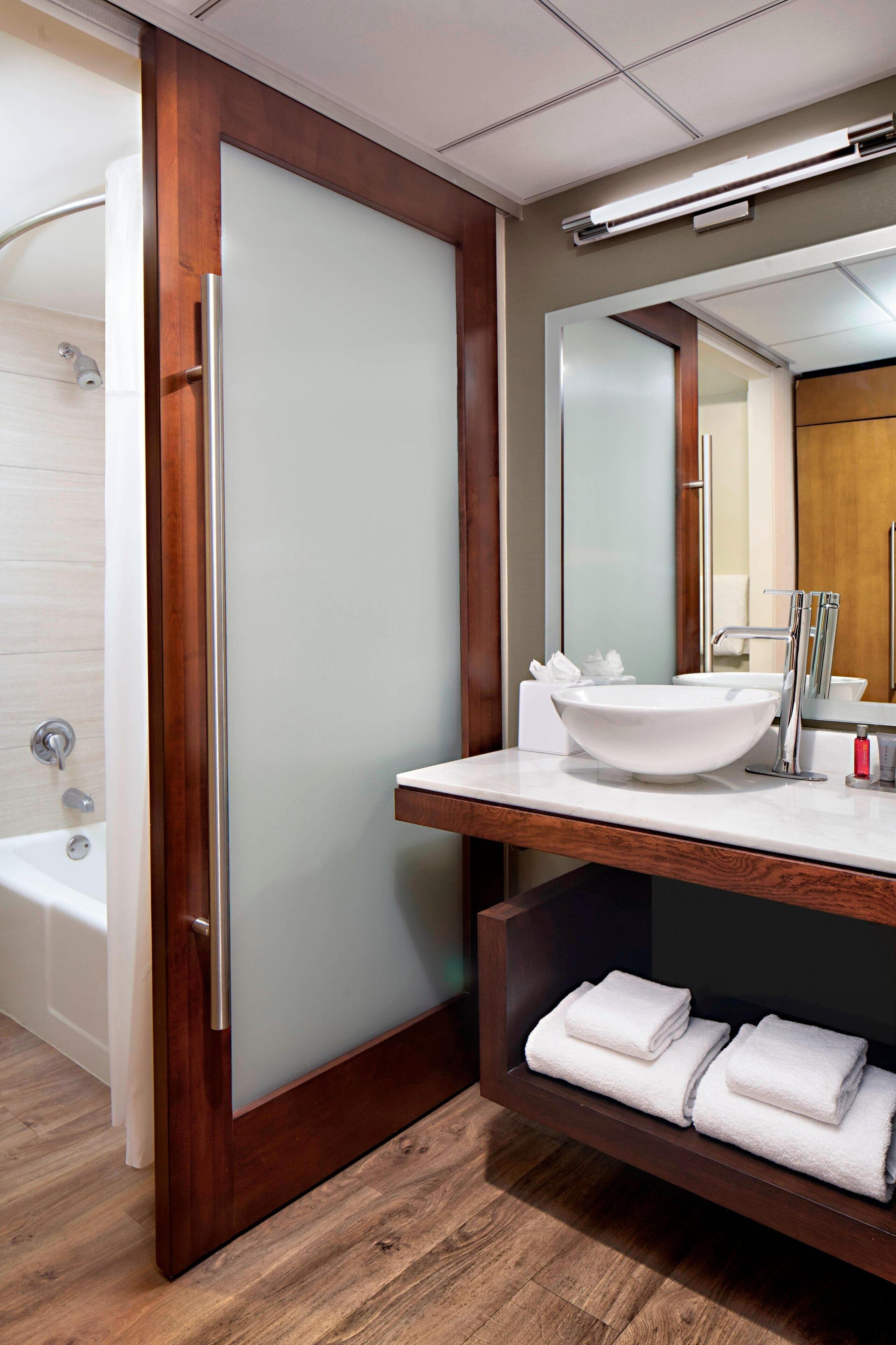 designer toiletries, hair dryer, bathrobes, towels