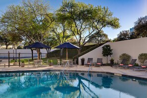 Outdoor pool, pool umbrellas, sun loungers