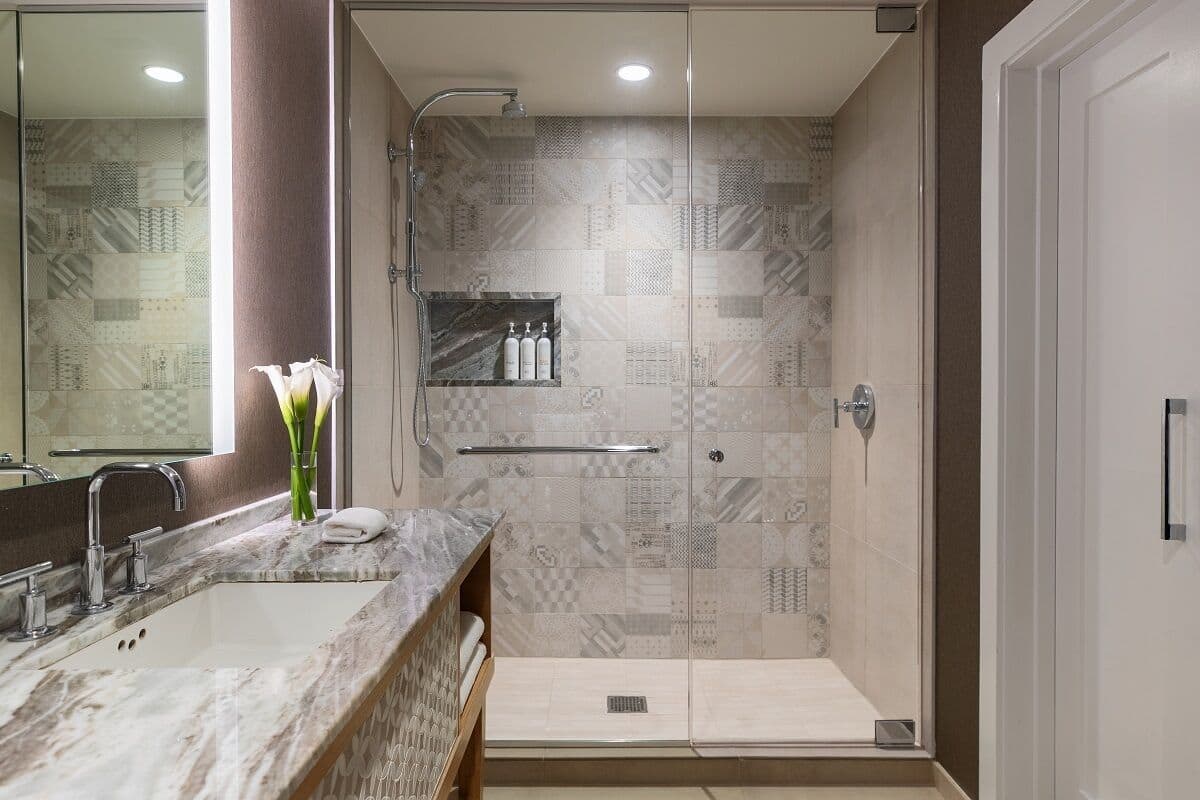 designer toiletries, hair dryer, bathrobes, towels