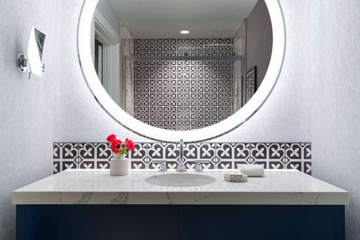 designer toiletries, hair dryer, bathrobes, towels