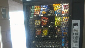 A vending machine with various snack options. - Red Roof Inn Washington, DC (Washington)