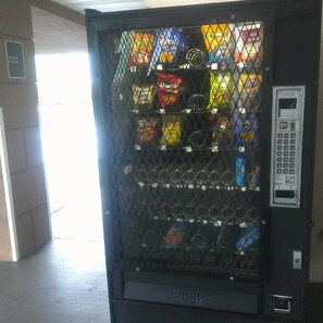 A vending machine with various snack options. - Red Roof Inn Washington, DC (Washington)