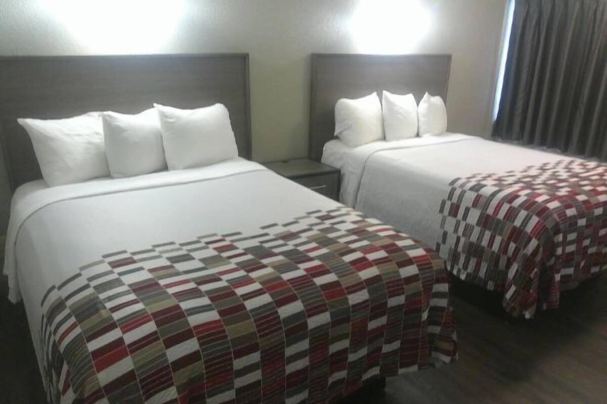 Desk, laptop workspace, blackout drapes, cribs (free)