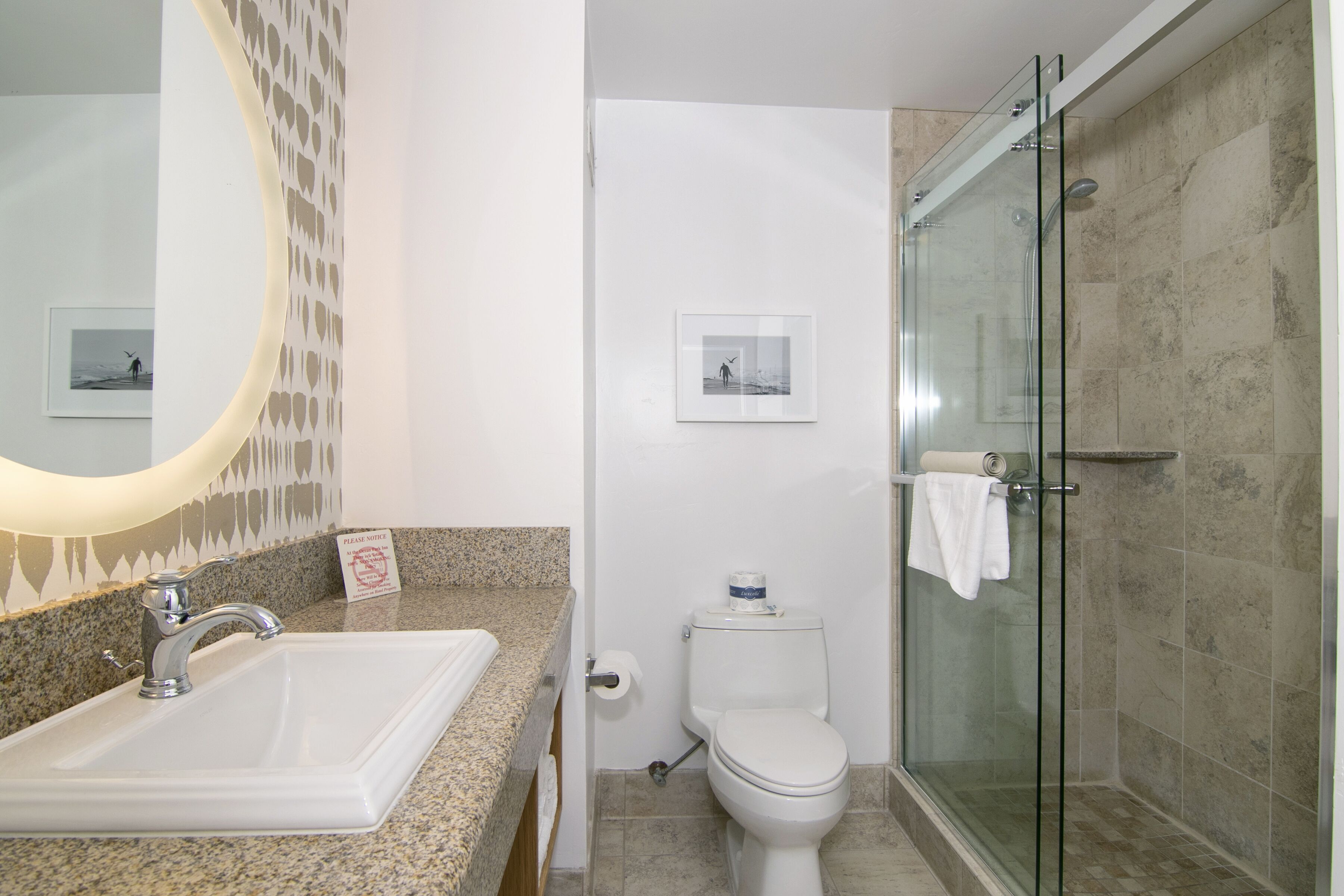 shower, designer toiletries, hair dryer, towels