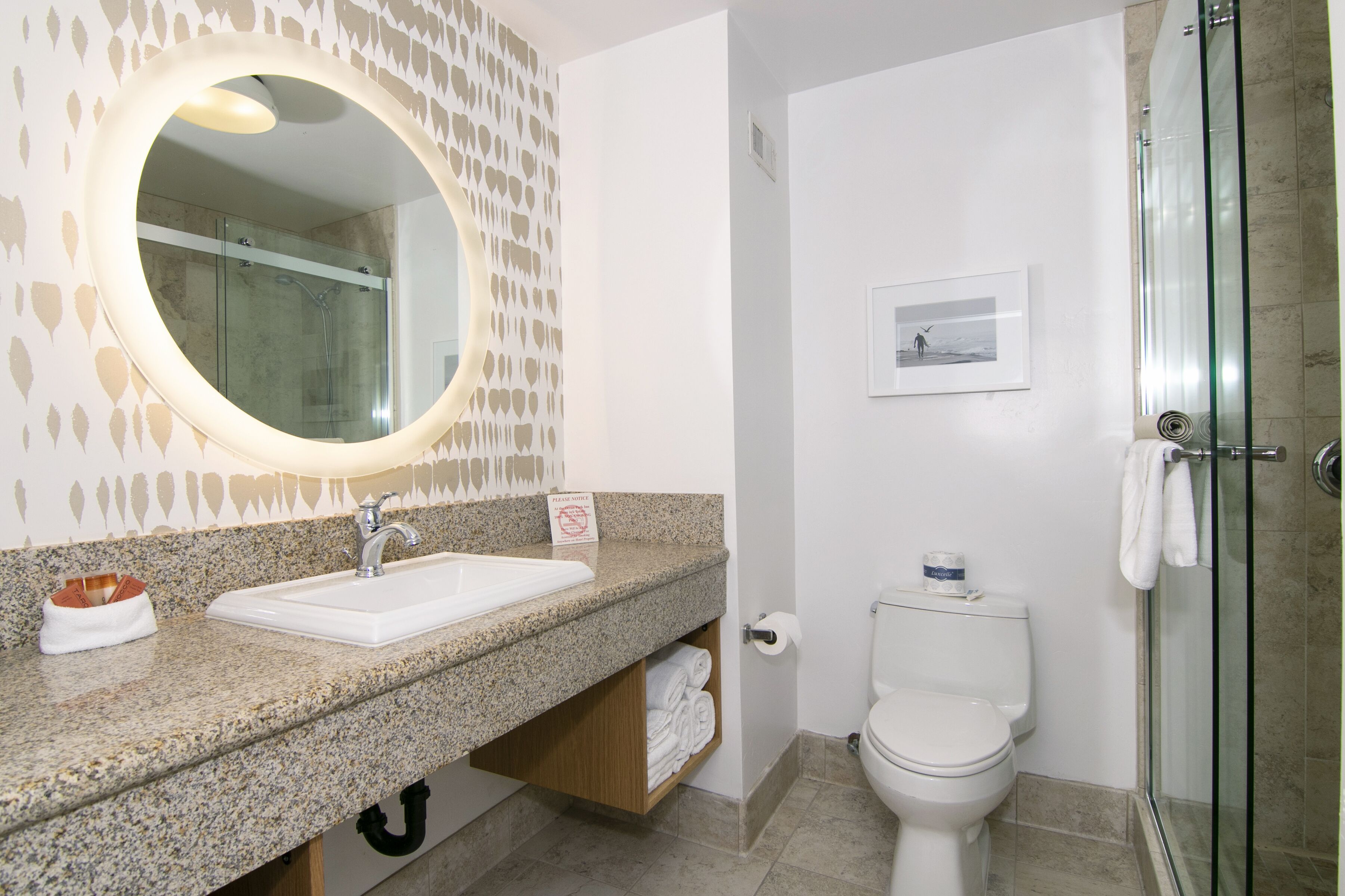 shower, designer toiletries, hair dryer, towels