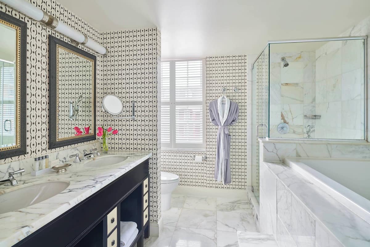 Designer toiletries, hair dryer, bathrobes, towels