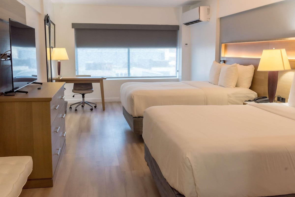 Hypo-allergenic bedding available, in-room safe, desk, laptop workspace