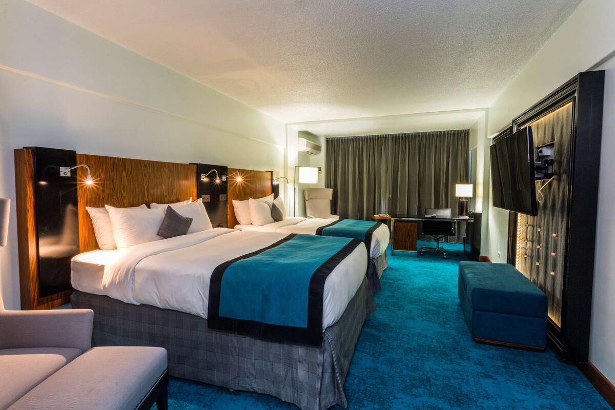 Hypo-allergenic bedding available, in-room safe, desk, laptop workspace