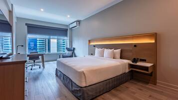 Suite, 2 Bedrooms, City View | Hypo-allergenic bedding, in-room safe, desk, laptop workspace