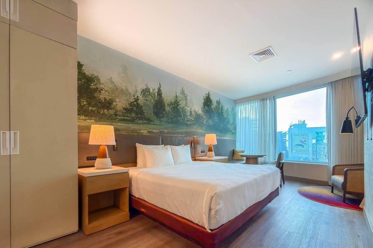 Suite, 2 Bedrooms, Sea View (1 King Bed, 2 Double Beds) | Hypo-allergenic bedding available, in-room safe, desk, laptop workspace