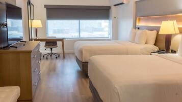 Literie hypoallergénique, coffres-forts dans les chambres, bureau