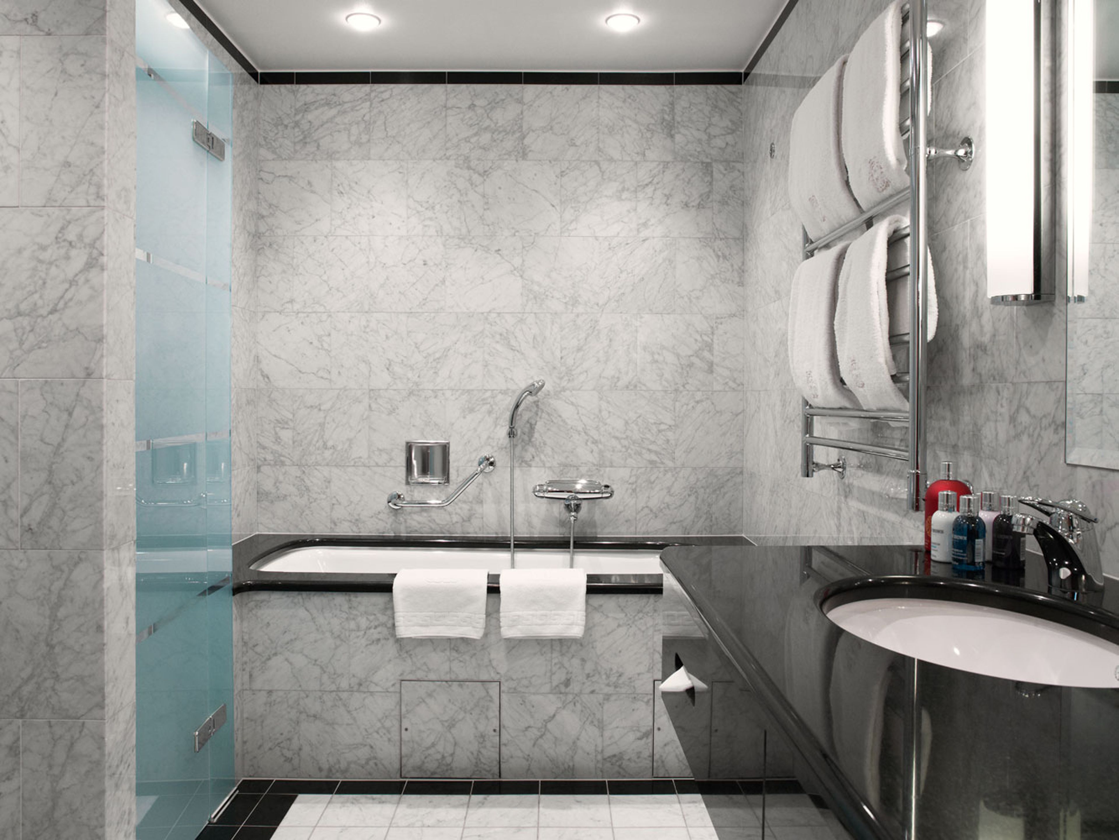 rainfall showerhead, designer toiletries, hair dryer, bathrobes