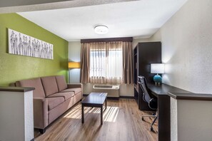 Premium bedding, desk, laptop workspace, blackout curtains