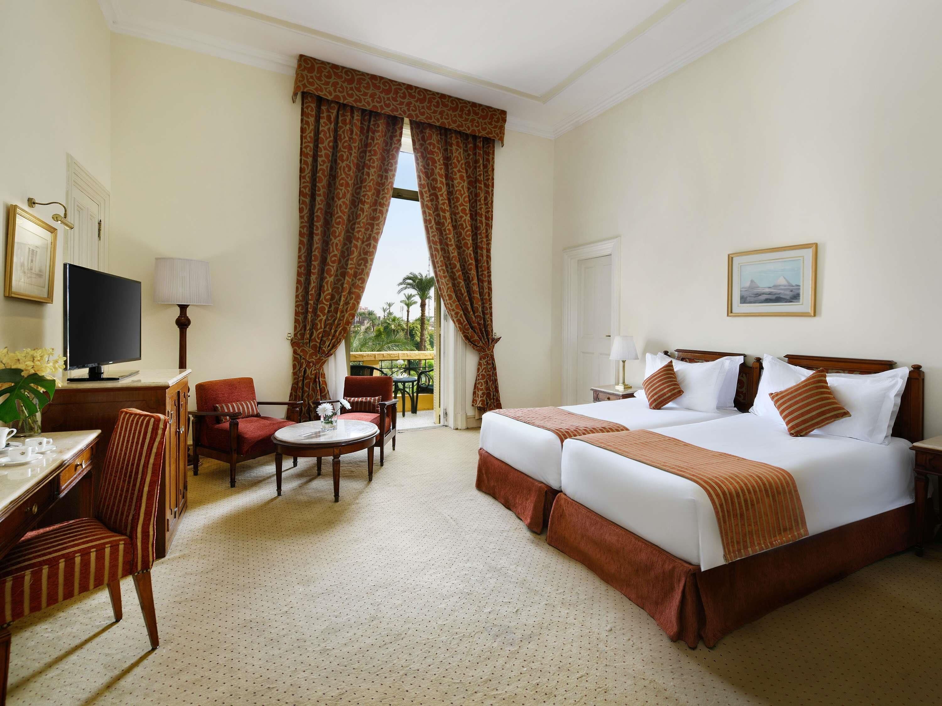 Premium bedding, pillow-top beds, minibar, in-room safe