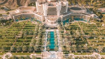 Experience the grandeur of this luxurious hotel, surrounded by serene gardens and a tranquil courtyard with a swimming pool.
