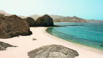 Private beach, sun loungers, beach umbrellas, beach towels