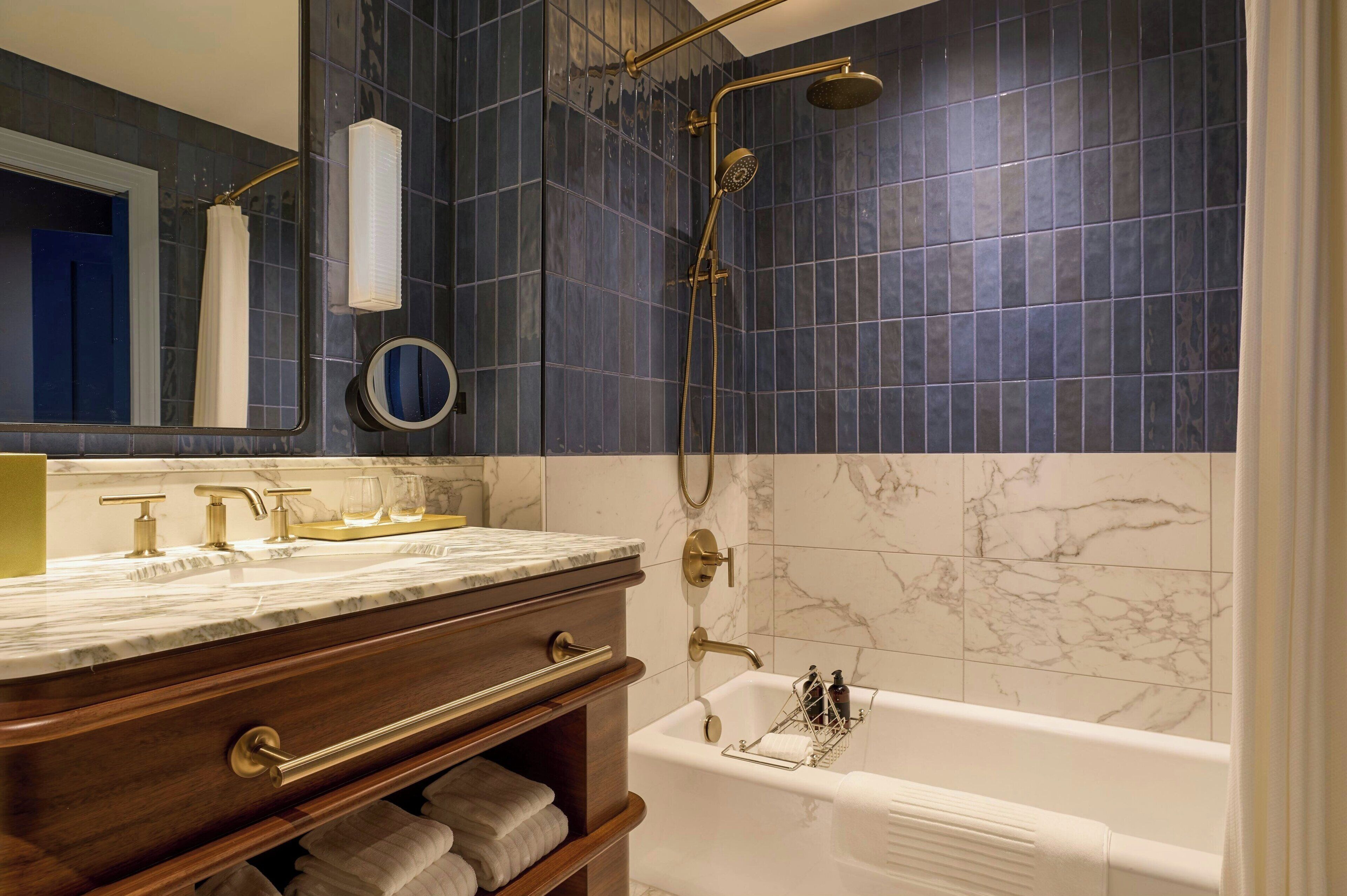 combined shower/bathtub, free toiletries, hair dryer, towels