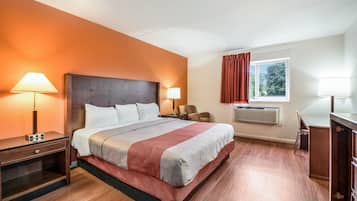 Desk, blackout drapes, bed sheets