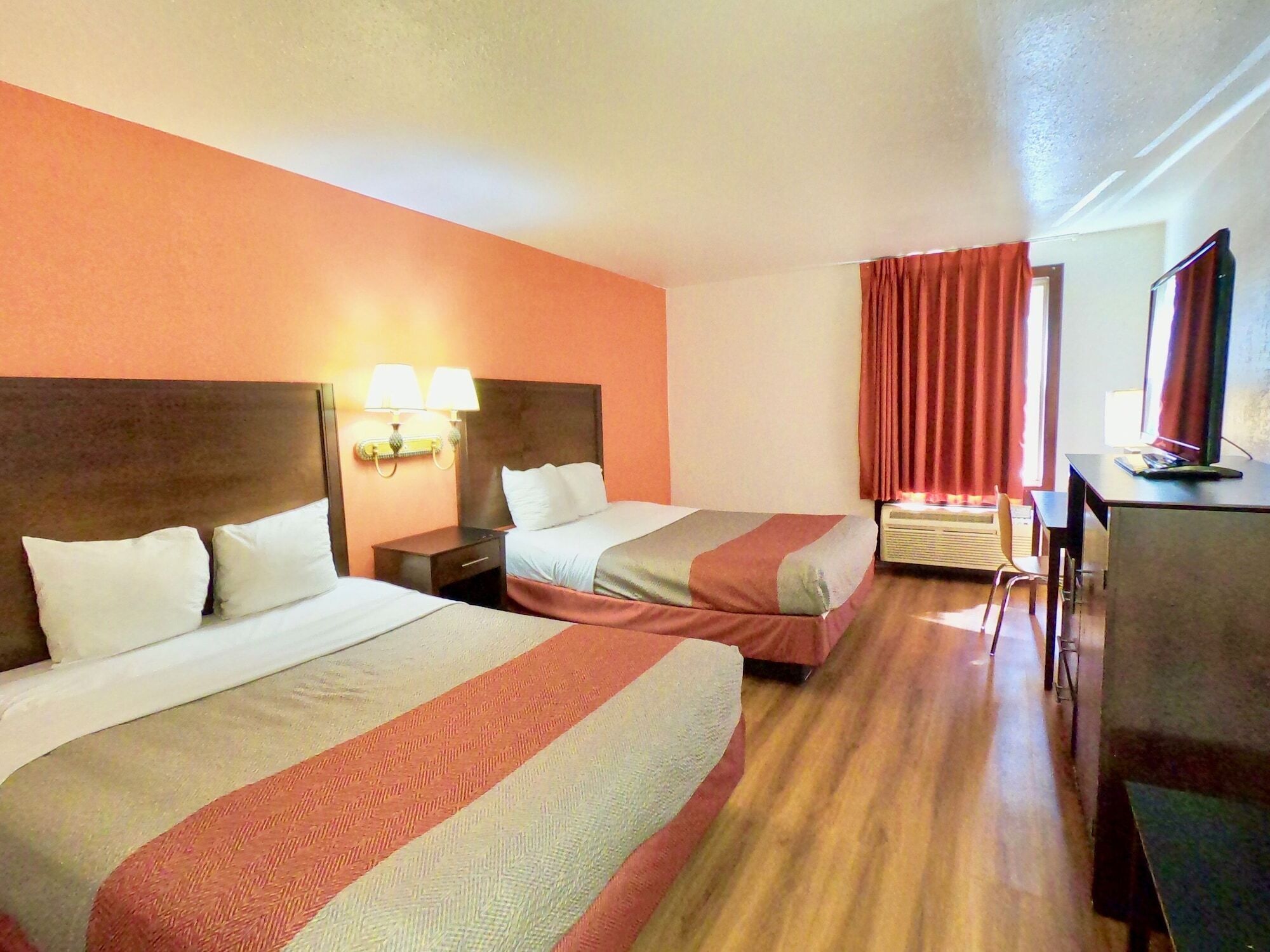 Desk, blackout drapes, bed sheets