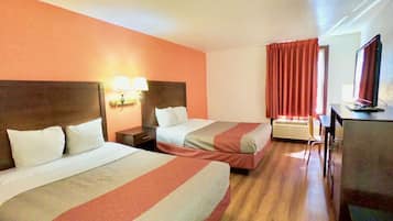 Desk, blackout drapes, bed sheets