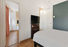 Standard Triple Room, Non Smoking | Desk, laptop workspace, blackout drapes, soundproofing