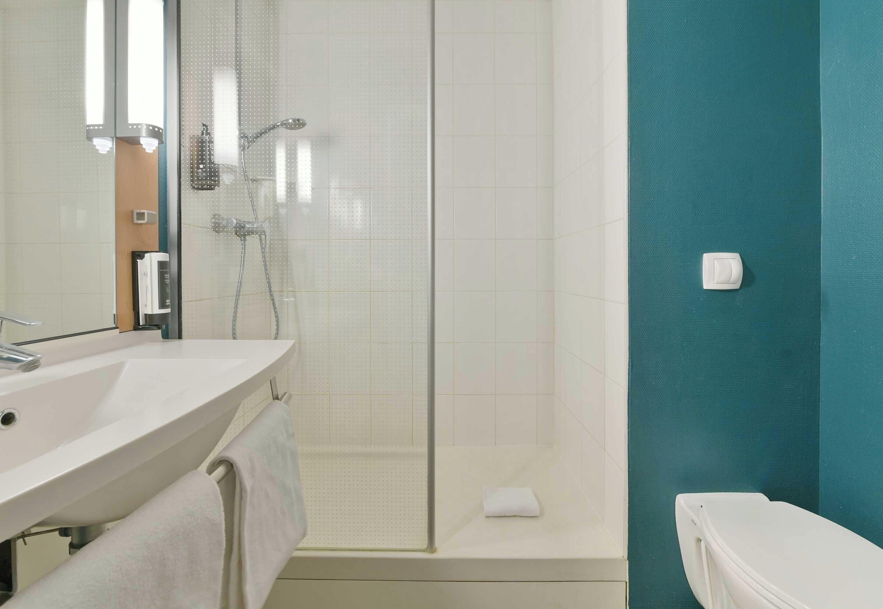 shower, eco-friendly toiletries, hair dryer, towels
