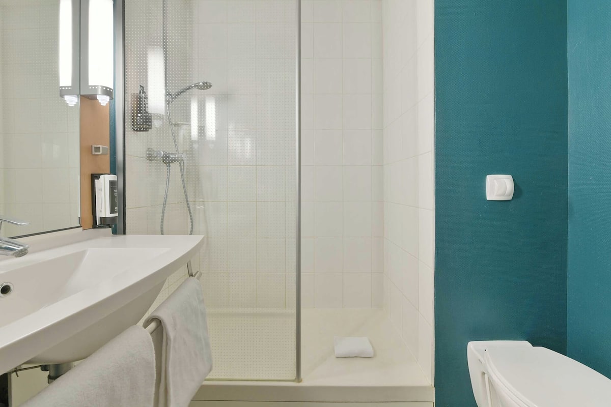 shower, eco-friendly toiletries, hair dryer, towels
