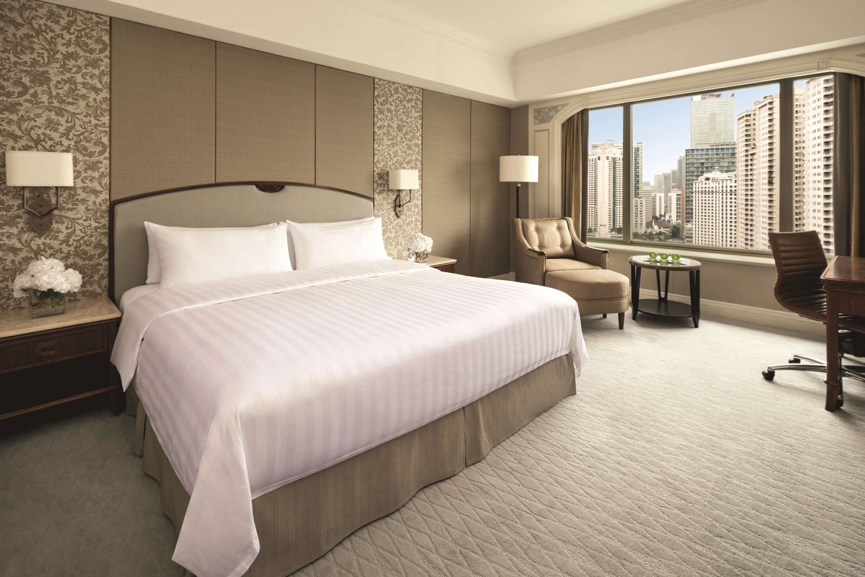 Premium bedding, down comforters, pillowtop beds, minibar