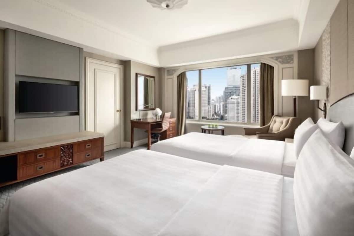 Premium bedding, down comforters, pillowtop beds, minibar