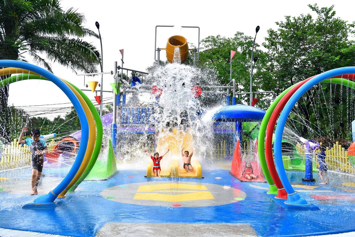 A water park with slides and water jets.