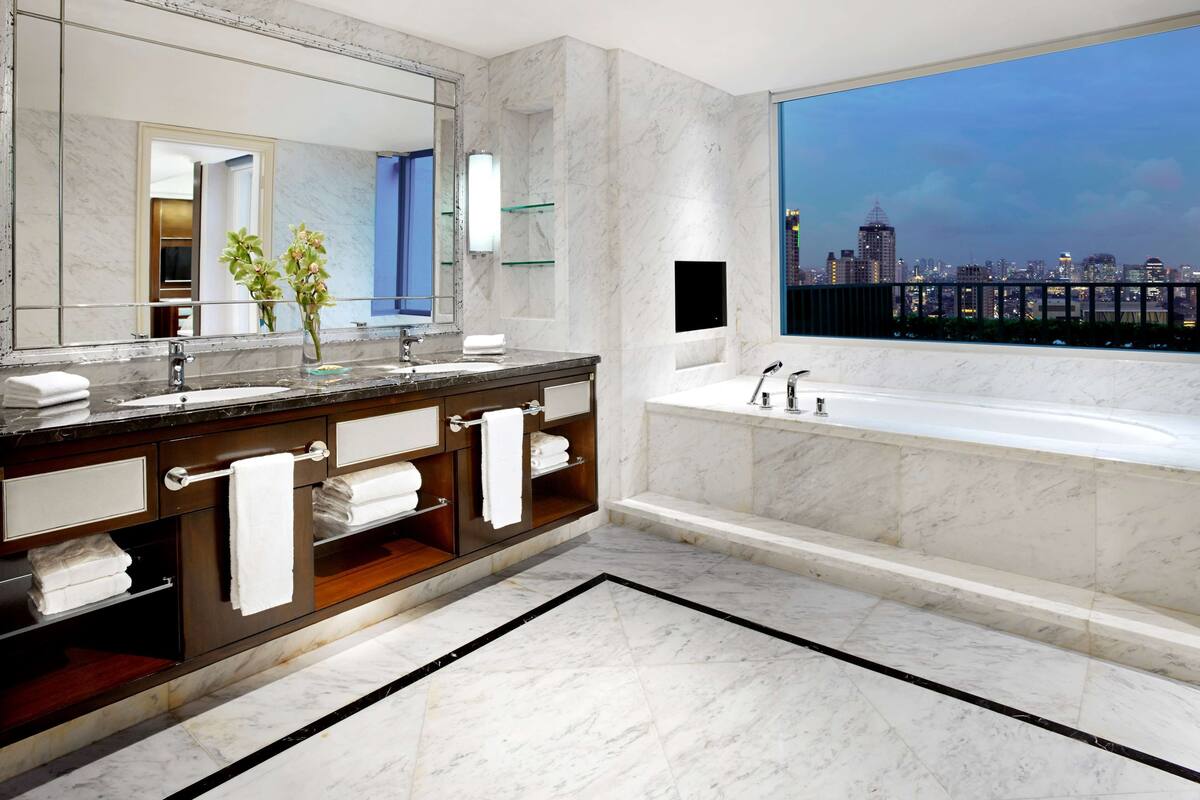 separate bathtub and shower, free toiletries, hair dryer, slippers