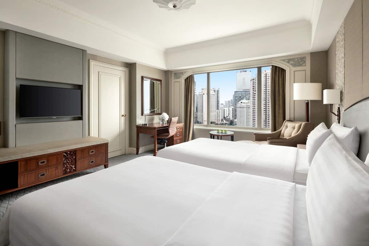 Premium bedding, down comforters, pillowtop beds, minibar