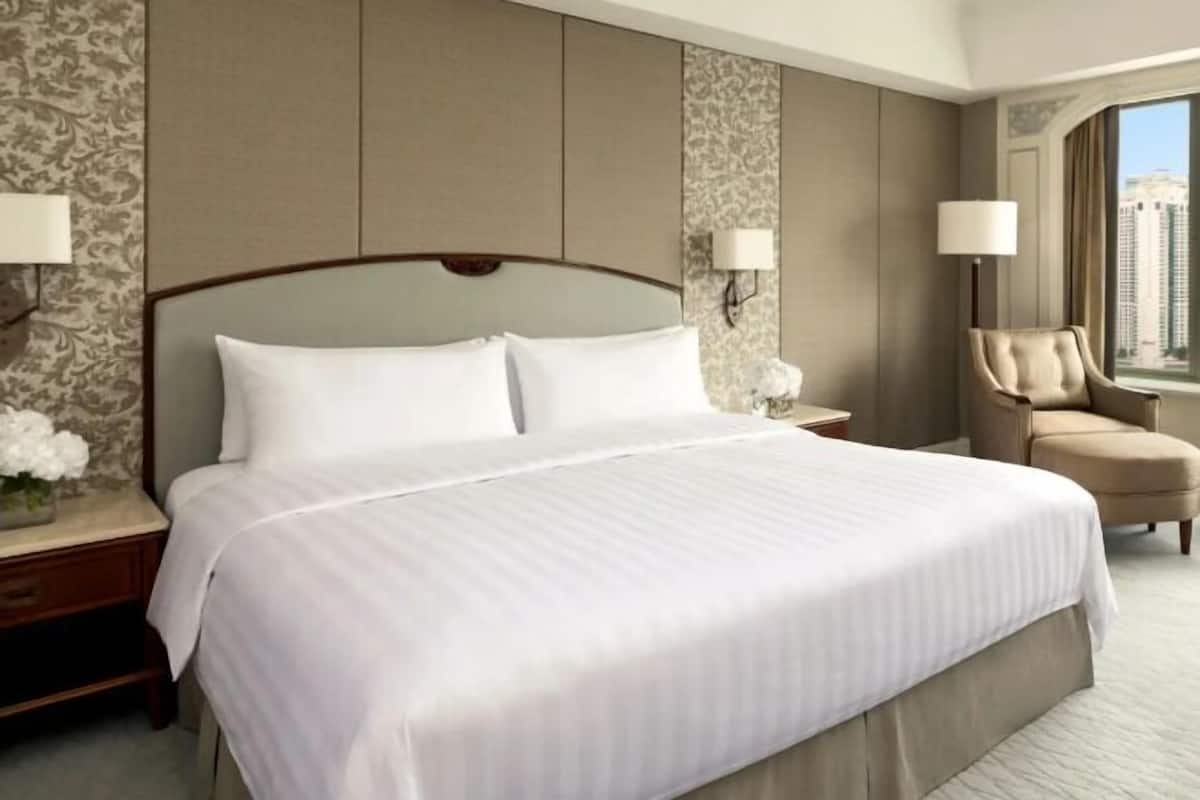 Premium bedding, down comforters, pillowtop beds, minibar