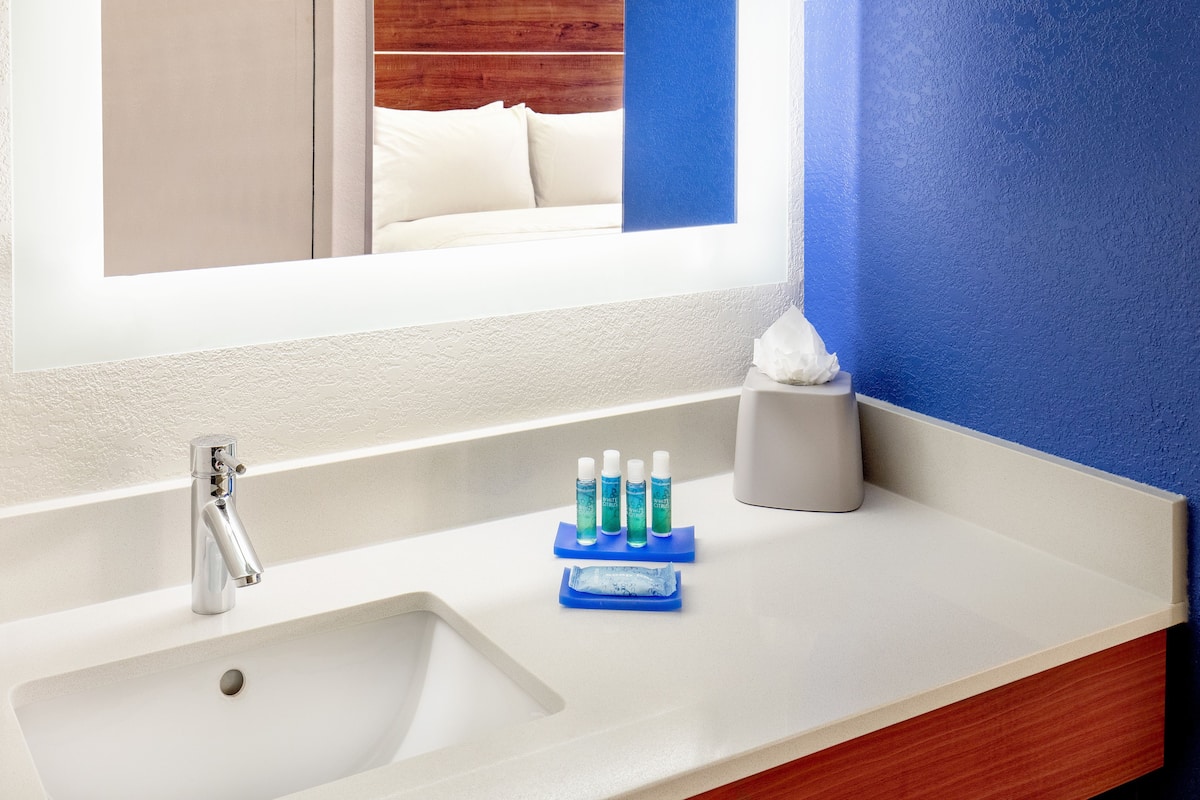 hair dryer, towels, soap, shampoo