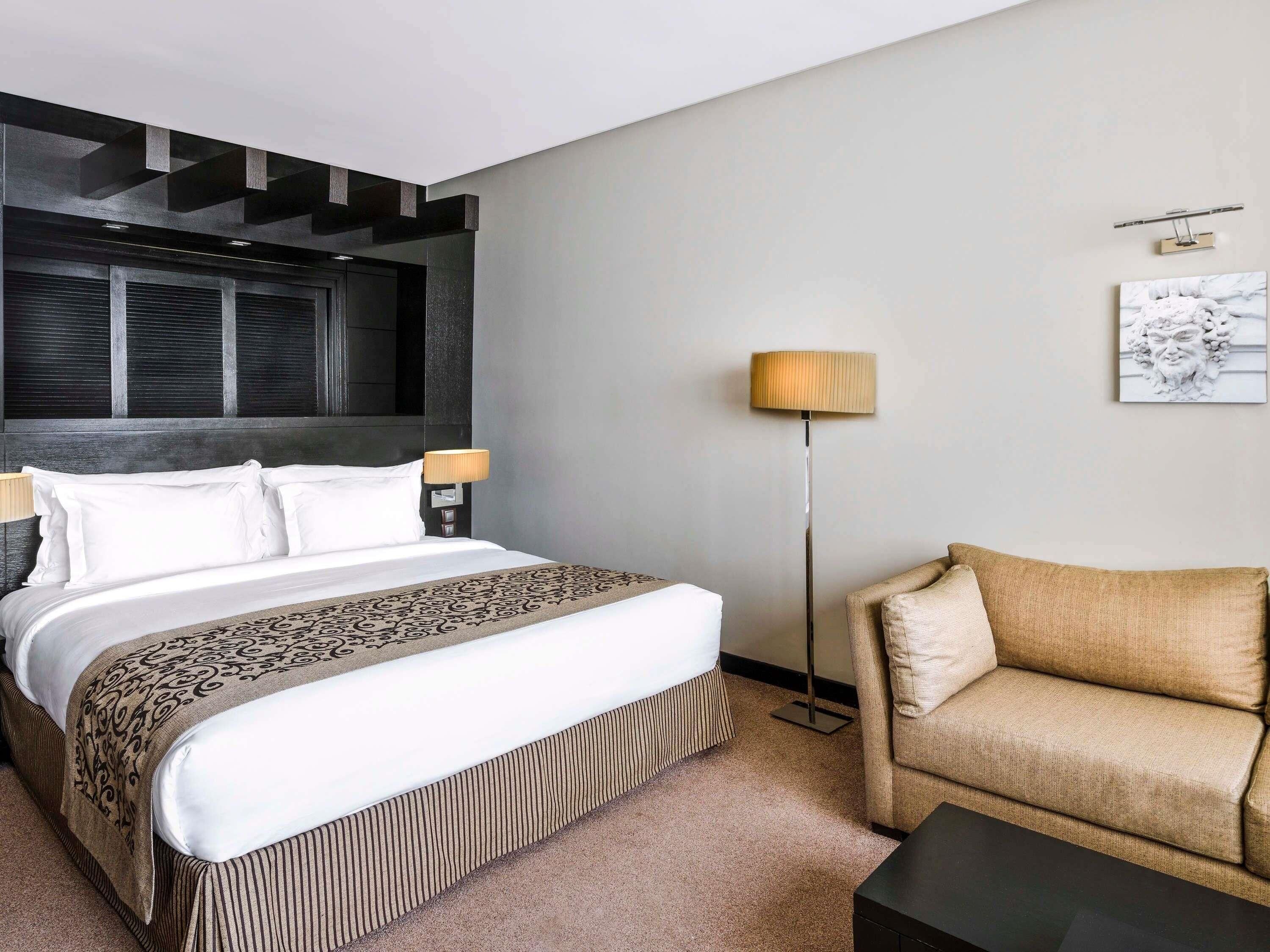 Premium bedding, down comforters, minibar, in-room safe