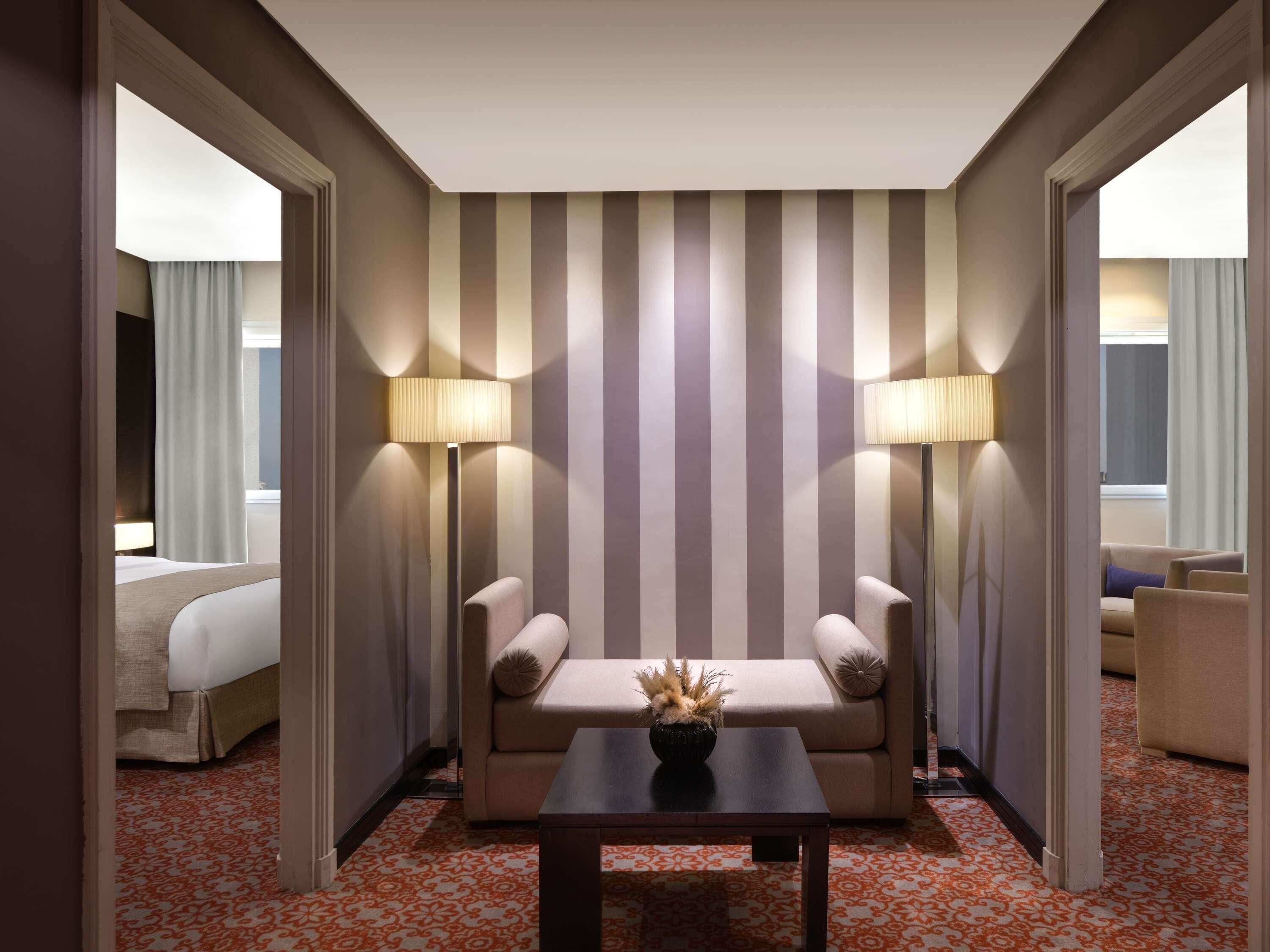 Suite familiar, 2 habitaciones | Ropa de cama de alta calidad, edredón y minibar 