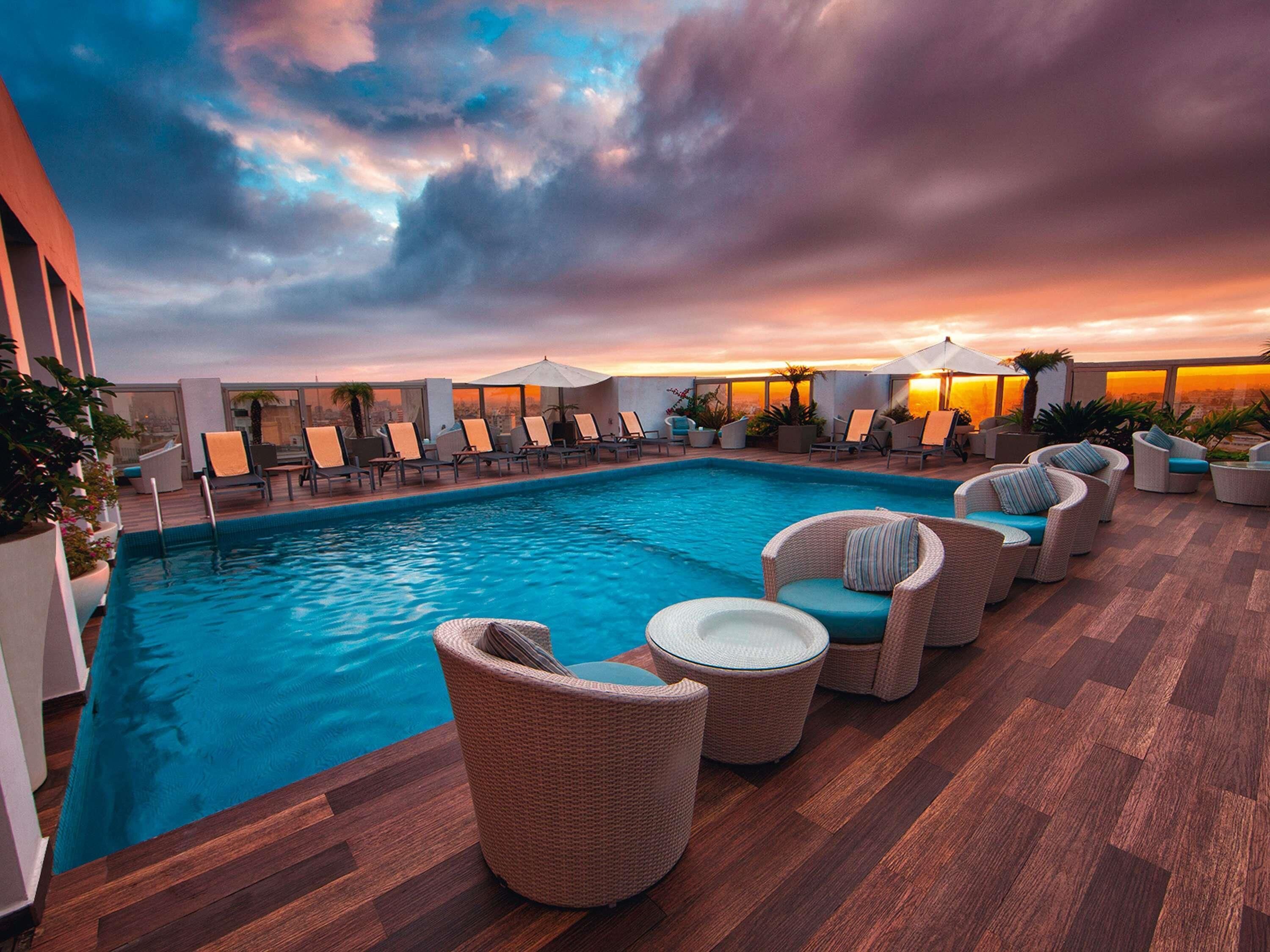 Outdoor pool, open 10:00 AM to 6:00 PM, sun loungers