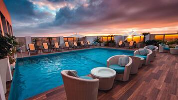 Outdoor pool, open 10:00 AM to 6:00 PM, sun loungers