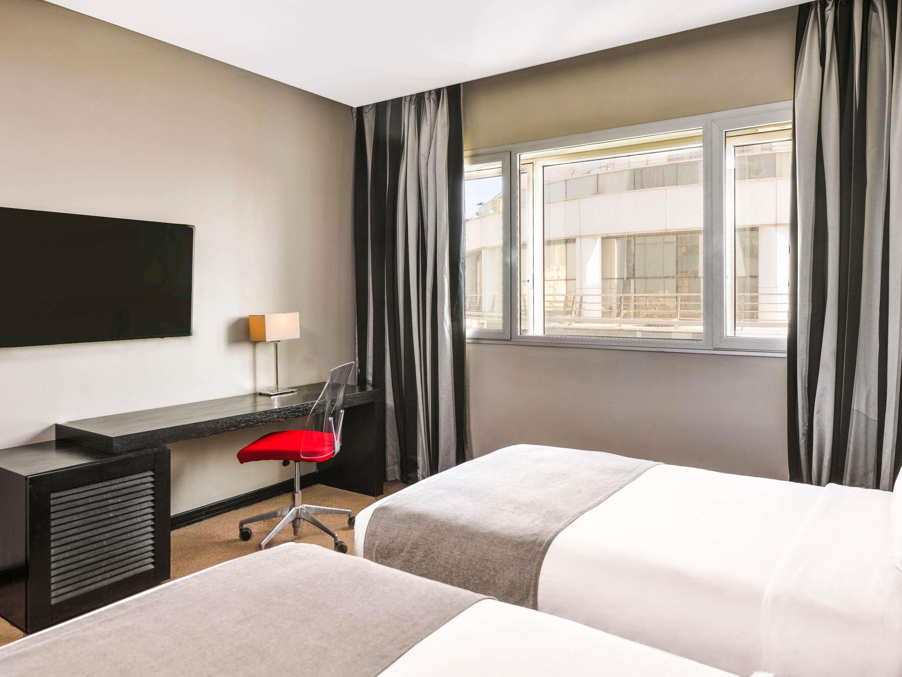 Premium bedding, down duvets, minibar, in-room safe