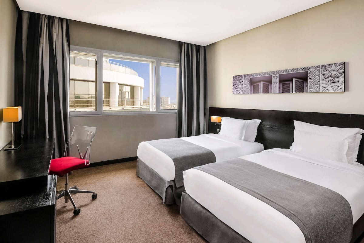 Premium bedding, down duvets, minibar, in-room safe