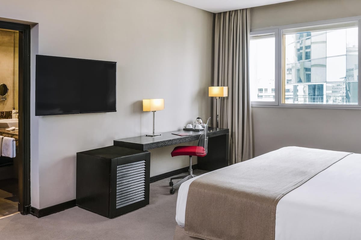 Premium bedding, down duvets, minibar, in-room safe