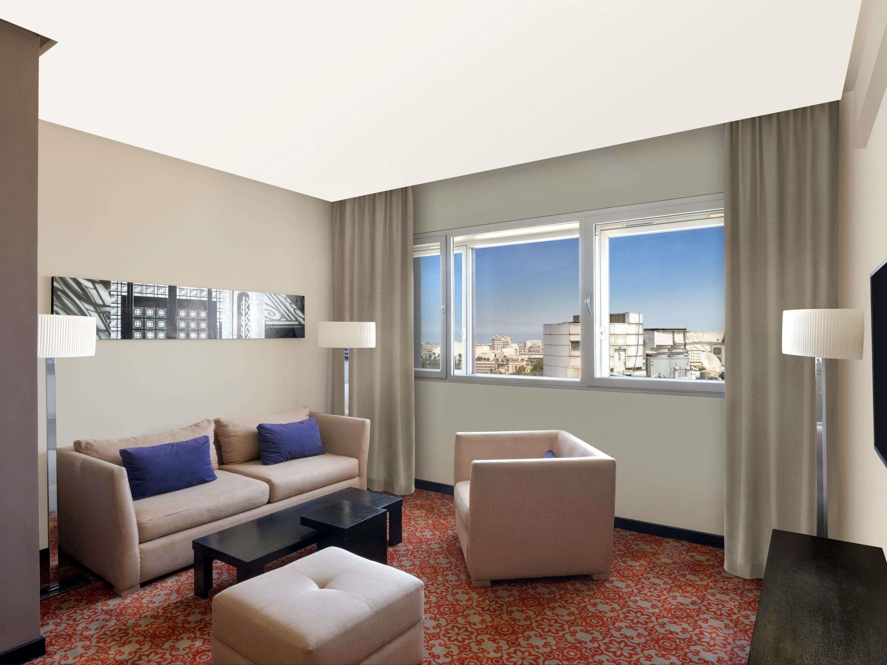 Premium bedding, down comforters, minibar, in-room safe